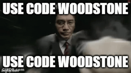 A Man In A Suit And Tie Is Holding A Gun With A Caption That Says Use Code Woodstone GIF