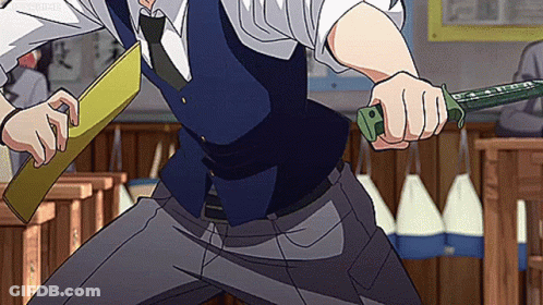 A Man In A Suit And Tie Is Holding A Knife And A Piece Of Paper . GIF