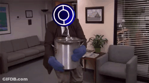 A Man In A Suit And Tie Is Holding A Large Pot In A Living Room . GIF