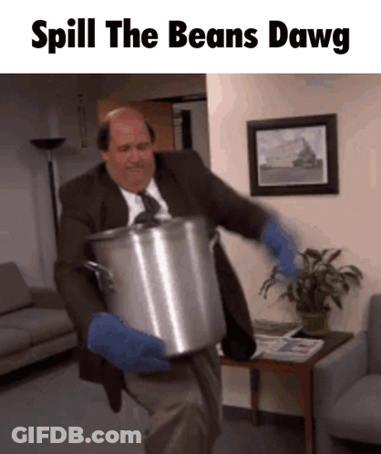 A Man In A Suit And Tie Is Holding A Large Pot That Says Spill The Beans Dawg On The Bottom GIF