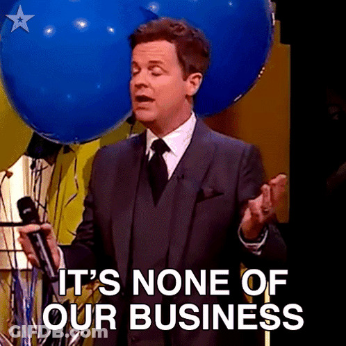 A Man In A Suit And Tie Is Holding A Microphone And Says " It 'S None Of Our Business " GIF