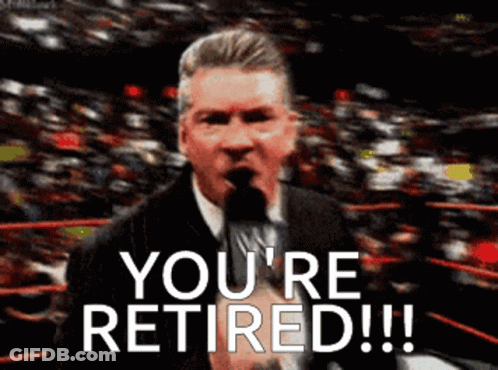 A Man In A Suit And Tie Is Holding A Microphone And Says You 'Re Retired GIF
