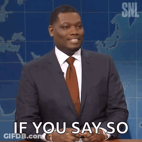 A Man In A Suit And Tie Is Holding A Pencil And Says If You Say So GIF