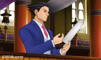 A Man In A Suit And Tie Is Holding A Piece Of Paper In His Hand GIF
