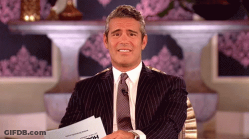 Man In Suit Holding House Paper GIF
