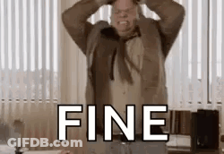 A Man In A Suit And Tie Is Holding His Head In A Room With The Word Fine . GIF
