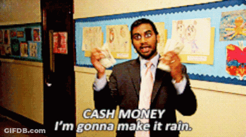 A Man In A Suit And Tie Is Holding Money And Saying Cash Money I 'M Gonna Make It Rain . GIF