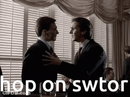 A Man In A Suit And Tie Is Hugging Another Man With The Words Hop On Swtor Below Them GIF