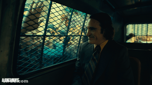Man In Suit And Tie In Jail Cell #JokerMovie GIF