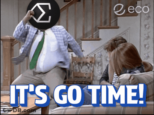 A Man In A Suit And Tie Is Jumping In The Air With The Words It 'S Go Time GIF