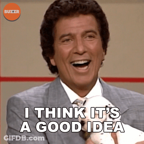 A Man In A Suit And Tie Is Laughing And Says I Think It 'S A Good Idea GIF