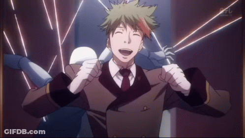 A Man In A Suit And Tie Is Laughing In Front Of A Sign That Says ' Tbs ' On It GIF