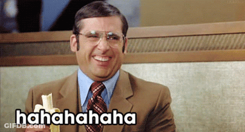A Man In A Suit And Tie Is Laughing While Holding A Banana And Says ' Hahahahaha ' In White Letters GIF