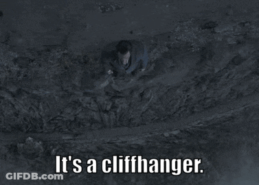 A Man In A Suit And Tie Is Laying In The Dirt With The Words " It 'S A Cliffhanger " Below Him GIF
