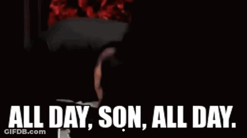 A Man In A Suit And Tie Is Looking At Himself In A Mirror And Saying `` All Day , Son , All Day '' GIF