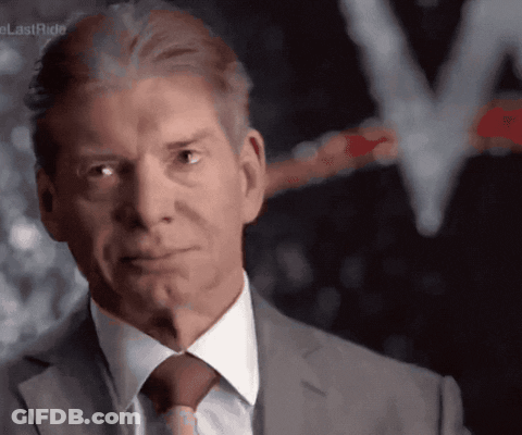 A Man In A Suit And Tie Is Looking At The Camera With A Lastride Logo In The Background GIF