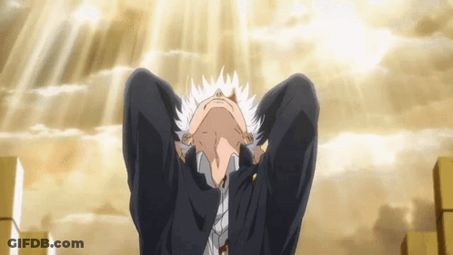 A Man In A Suit And Tie Is Looking Up At The Sky With His Hands Behind His Head GIF