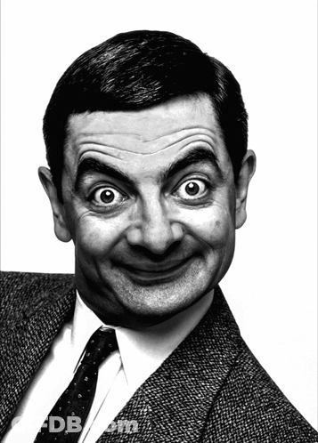A Man In A Suit And Tie Is Making A Face GIF