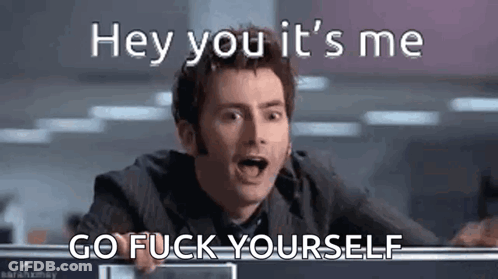 A Man In A Suit And Tie Is Making A Funny Face And Saying `` Hey You It 'S Me Go Fuck Yourself `` . GIF