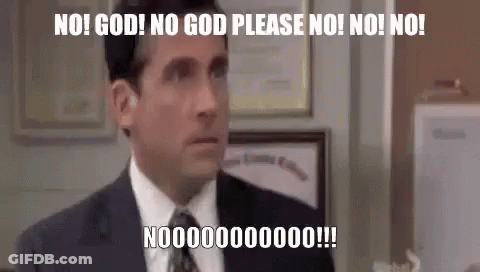 A Man In A Suit And Tie Is Making A Funny Face And Saying No ! GIF