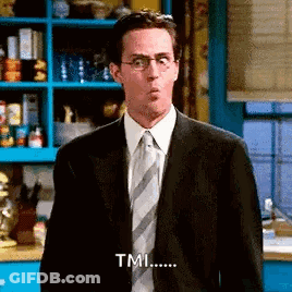 A Man In A Suit And Tie Is Making A Funny Face And Saying `` Tmi ... '' . GIF