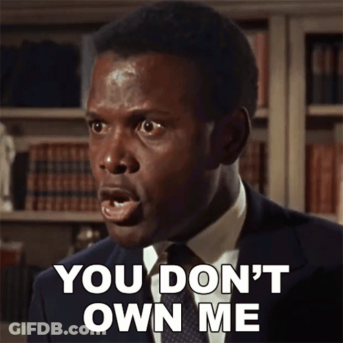 A Man In A Suit And Tie Is Making A Funny Face And Saying " You Don 'T Own Me " GIF