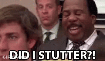 A Man In A Suit And Tie Is Making A Funny Face And Says `` Did I Stutter ? '' GIF