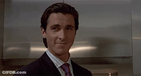 A Man In A Suit And Tie Is Making A Funny Face And Says `` Maybe I Don T Know '' . GIF