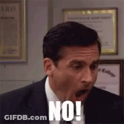 Man In Suit Making Funny Face Saying No GIF
