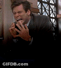 A Man In A Suit And Tie Is Making A Funny Face And Says So Hard I Ship This . GIF