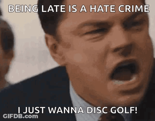 A Man In A Suit And Tie Is Making A Funny Face With The Caption Being Late Is A Hate Crime GIF