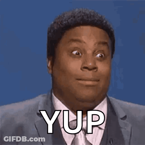 A Man In A Suit And Tie Is Making A Funny Face With The Word Yup . GIF