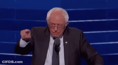 A Man In A Suit And Tie Is Pointing And Saying Excellent Point . GIF