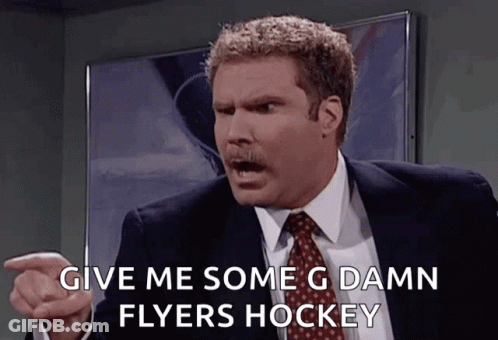 A Man In A Suit And Tie Is Pointing And Saying Give Me Some Damn Flyers Hockey GIF