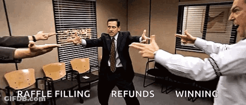 A Man In A Suit And Tie Is Pointing At Another Man In A Suit And Tie . GIF