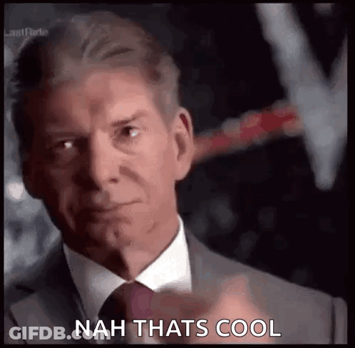 A Man In A Suit And Tie Is Pointing At The Camera And Saying `` Nah That 'S Cool '' . GIF