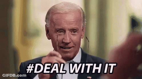 A Man In A Suit And Tie Is Pointing At The Camera With The Words `` Deal With It '' Written Below Him . GIF