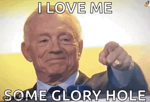 A Man In A Suit And Tie Is Pointing At The Camera With The Words I Love Me Some Glory Hole Below Him GIF