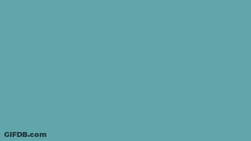 A Man In A Suit And Tie Is Pointing Up With A Freepptx Logo Behind Him GIF