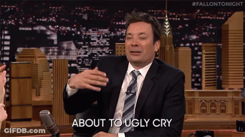 A Man In A Suit And Tie Is Saying About To Ugly Cry . GIF