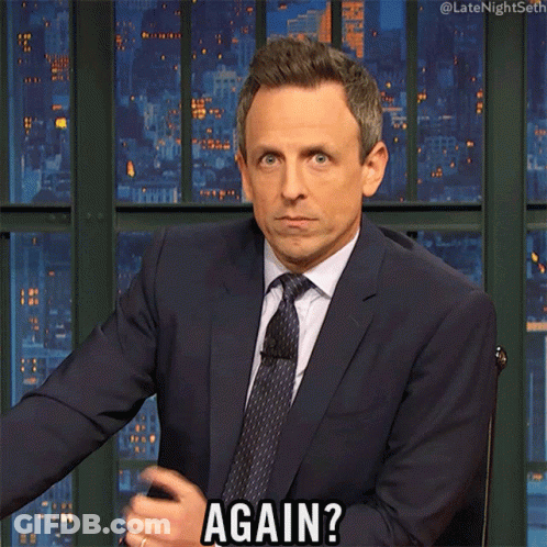 A Man In A Suit And Tie Is Saying " Again " GIF