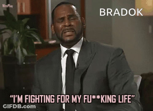 A Man In A Suit And Tie Is Saying Bradok GIF