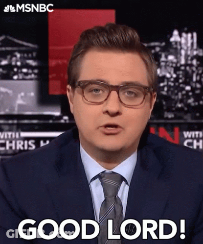 A Man In A Suit And Tie Is Saying " Good Lord " GIF