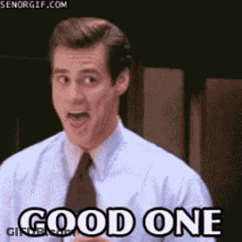 A Man In A Suit And Tie Is Saying Good One . GIF