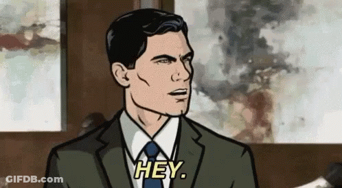 A Man In A Suit And Tie Is Saying `` Hey '' In A Cartoon . GIF