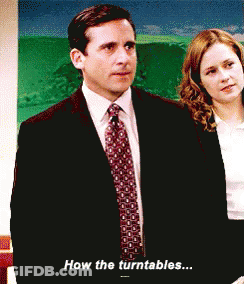 A Man In A Suit And Tie Is Saying How The Turntables ... GIF