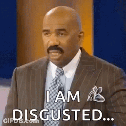 A Man In A Suit And Tie Is Saying `` I Am Disgusted ... '' GIF