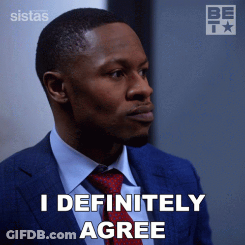 A Man In A Suit And Tie Is Saying " I Definitely Agree " GIF
