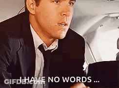A Man In A Suit And Tie Is Saying `` I Have No Words '' . GIF