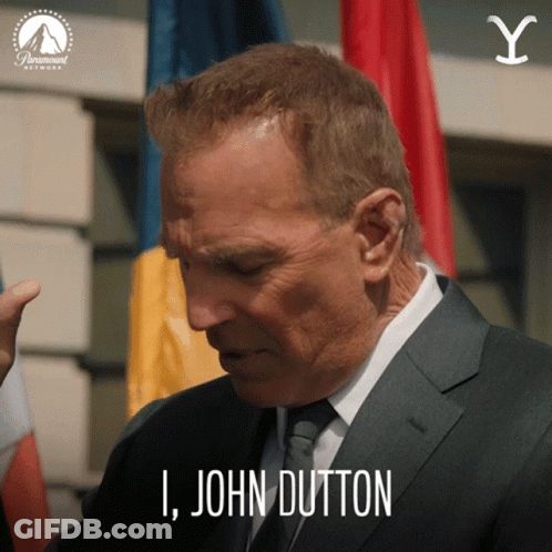 A Man In A Suit And Tie Is Saying " I John Dutton " GIF